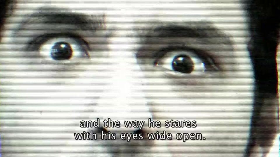 Extreme close-up of Mr. Mokhtar’s wide-open eyes